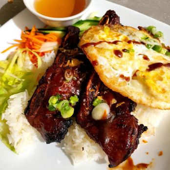Hong Huong - a plate of food with rice and meat - Vietnamese Near Me - Edmonton, Alberta Hong Huong - a plate of food with rice and meat - Vietnamese Near Me - Edmonton, Alberta