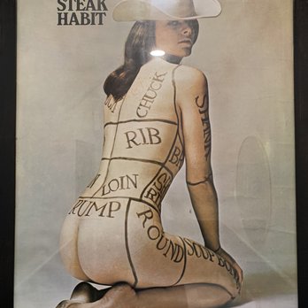 Taste on Main - "Art" in men's restroom, curated by Hannibal Lector and Buffalo Bill. Approximately 20x30 movie poster size. - Seafood Near Me - Buda, Texas