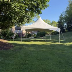 Athom Event and Party Rental - Tent and table set up.