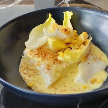 Theophile - a bowl of food on a table - Wine Bars Near Me - Saint-Bruno-de-Montarville, Quebec Theophile - a bowl of food on a table - Wine Bars Near Me - Saint-Bruno-de-Montarville, Quebec