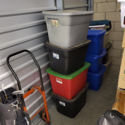 US Storage Centers - How the plastic bins looked as I left them upon moving in, before the employee thieves had went through my plastic bins. DO NOT RENT HERE.