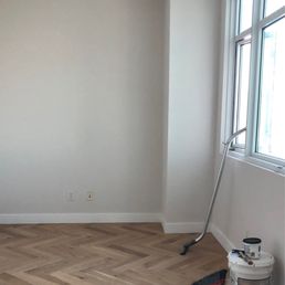 New flooring in living, kitchen, dining, entry, and hallway (engineered white oak in herringbone) New flooring in living, kitchen, dining, entry, and hallway (engineered white oak in herringbone)