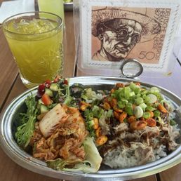 Chicken rice bowl and a Maui Z cocktail Chicken rice bowl and a Maui Z cocktail