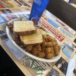 Ham and Cheese omelet with corned beef hash and perfectly cooked tater tots! Good morning!