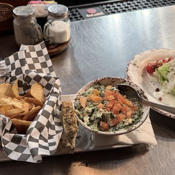 Ramble Creek Grill - Spinach artichoke dip with fresh kettle chips and I wedge ceaser salad. - Steakhouses Near Me - Richmond, Texas Ramble Creek Grill - Spinach artichoke dip with fresh kettle chips and I wedge ceaser salad. - Steakhouses Near Me - Richmond, Texas