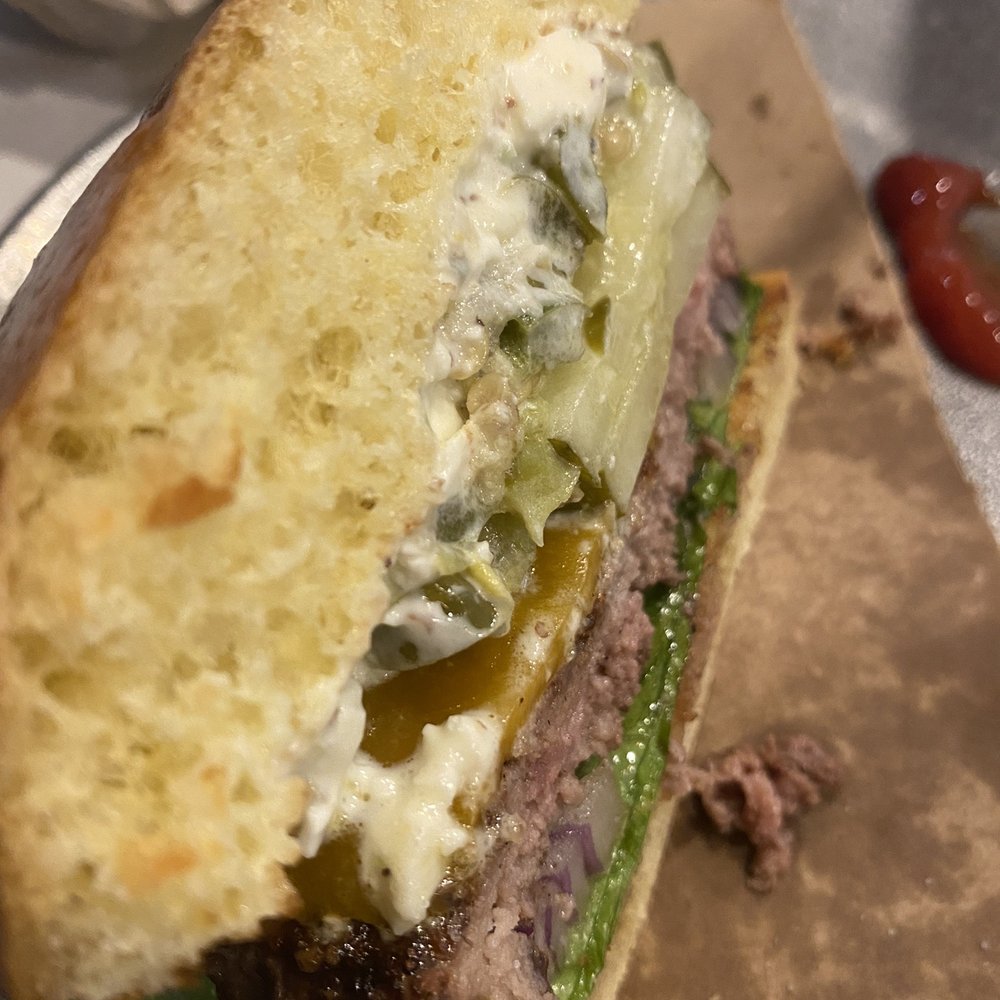 Village Burger Bar - The Cheddar Burger with blue cheese crumbles and jalapeños - Burgers Near Me - Plano, Texas Village Burger Bar - The Cheddar Burger with blue cheese crumbles and jalapeños - Burgers Near Me - Plano, Texas