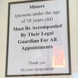 Oral Surgery and Dental Implant Center - A good office policy on display.