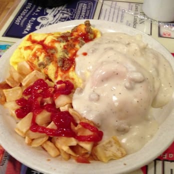 The Big Biscuit - Sausage and cheddar omelet, 1/2 biscuit and gravy and fried potatoes. - Breakfast & Brunch Near Me - Independence, Missouri The Big Biscuit - Sausage and cheddar omelet, 1/2 biscuit and gravy and fried potatoes. - Breakfast & Brunch Near Me - Independence, Missouri