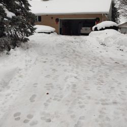 Cesar's Landscaping & Construction - 5"-6" of snow left AFTER plowing twice.