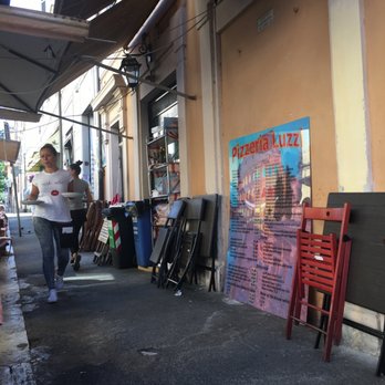 Luzzi - Street view. Outdoor seating. - Pizza Near Me - Rome, RM Luzzi - Street view. Outdoor seating. - Pizza Near Me - Rome, RM