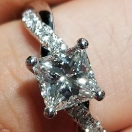 Beautiful princess cut diamond with platinum twisted setting and diamonds on the side. Thank you Annie!!