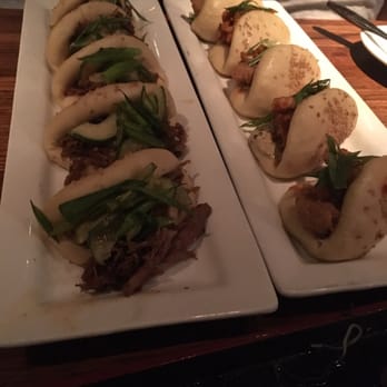 Linger - Left: Mongolian beef buns. Right: Fried chicken buns with kimchi inside. - Asian Fusion Near Me - Denver, Colorado Linger - Left: Mongolian beef buns. Right: Fried chicken buns with kimchi inside. - Asian Fusion Near Me - Denver, Colorado