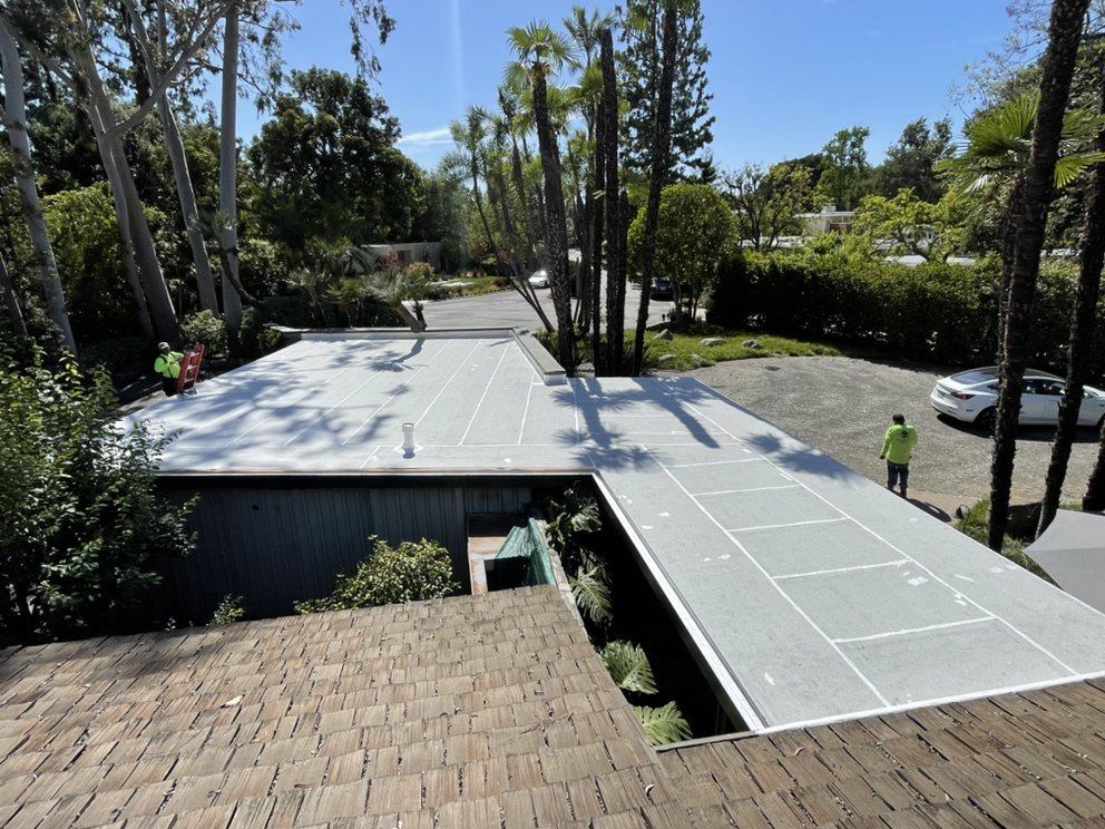 Slide of New Village Roofing