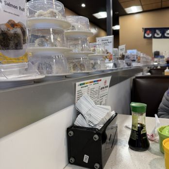 Akira Sushi - Tualatin - Plates organized by type on belt - Sushi Bars Near Me - Tualatin, Oregon