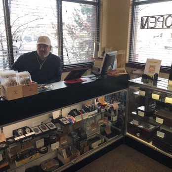 The Cigar Chapel - a man behind the counter - Tobacco Shops Near Me - Bend, Oregon The Cigar Chapel - a man behind the counter - Tobacco Shops Near Me - Bend, Oregon