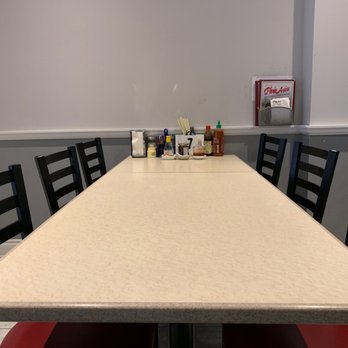 Pho Asia - a table and chairs in a restaurant - Vietnamese Near Me - Vaughan, Ontario Pho Asia - a table and chairs in a restaurant - Vietnamese Near Me - Vaughan, Ontario