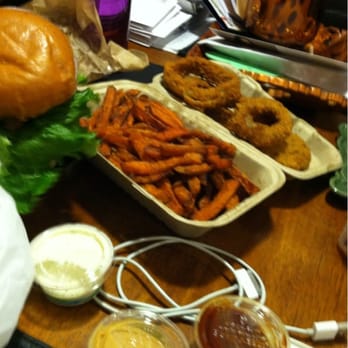 Bareburger - Edgewater - Onion rings, so perfect and crunchy. An sweet potato fries. And 3/4 sauces we got. All so gooood. - Burgers Near Me - Edgewater, New Jersey