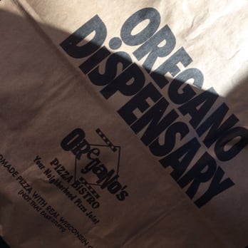 Oregano's - Their to go bags for food - Pizza Near Me - Tucson, Arizona