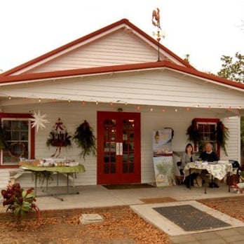 Grits and Groceries - a white house with red trim - Southern Near Me - Belton, South Carolina