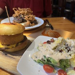 Dirty Philly dry aged burger, wedge, bison meatloaf.