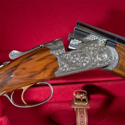 Cole Fine Guns and Gunsmithing - Cole Custom shotgun on display