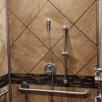Newell Station - a shower in a tiled bathroom - Grocery Near Me - Newton, Kansas Newell Station - a shower in a tiled bathroom - Grocery Near Me - Newton, Kansas