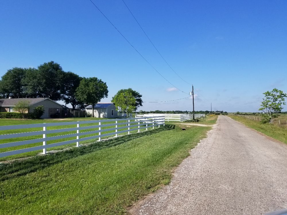 Slide of Pride of Texas Roof and Fence