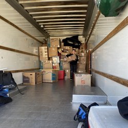 Cooper's Moving and Hauling Service - One of my kiddos helping them men.
