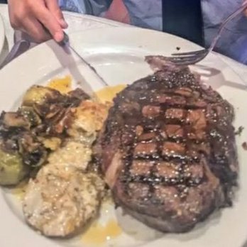 Padua Weddings - Gigantic ribeye with compound butter cooked to perfection with honey glazed brussel sprouts and garlic parm potatoes - Venues & Event Spaces Near Me - Claremont, California
