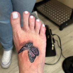 Ink Oasis - Butterfly landing on my foot