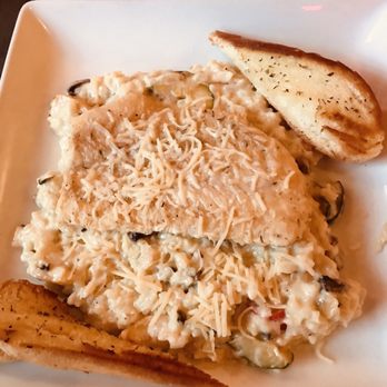 Riverfront Barbeque & Grille - Veggie risotto with pan seared haddock and garlic bread. Asked for extra garlic in the risotto- perfect - Barbeque Near Me - Augusta, Maine