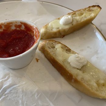 Antinoz Cafe - What's left of the appetizer. There were at least six more of these bread slices. - Italian Near Me - San Antonio, Texas
