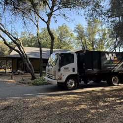 Waste Away - WasteAway truck picking up junk and trash