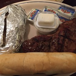 Whit's End 48 - Large house salad with very nice blue cheese dressing, lean sirloin and tasty baked potato. We enjoyed our dinner here.