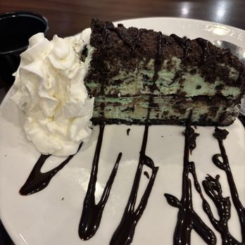 Duffy's Sports Grill - Mint chocolate chip ice cream cake with Oreo cookie crust - Sports Bars Near Me - Boynton Beach, Florida Duffy's Sports Grill - Mint chocolate chip ice cream cake with Oreo cookie crust - Sports Bars Near Me - Boynton Beach, Florida