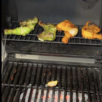 Bains Marinated Meat Shop - a grill with chicken and broccoli on it - Butcher Near Me - Sacramento, California Bains Marinated Meat Shop - a grill with chicken and broccoli on it - Butcher Near Me - Sacramento, California
