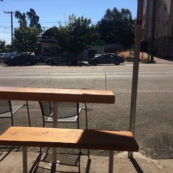 Un Bien - Seating area. Picnic style benches and some chairs. Probably can hold abt 20-25 ppl - Cuban Near Me - Seattle, Washington Un Bien - Seating area. Picnic style benches and some chairs. Probably can hold abt 20-25 ppl - Cuban Near Me - Seattle, Washington