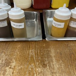 Randy's Smokehouse BBQ - Extra bbq sauces besides the one served behind the counter.