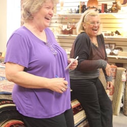 Ten Thousand Villages - Dedicated staff & volunteers share a laugh during our Annual Rug Event!