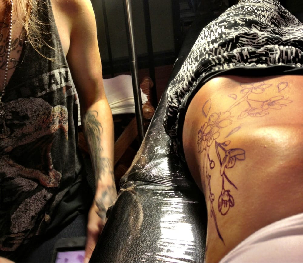 Tattoos by Em Scott Logo