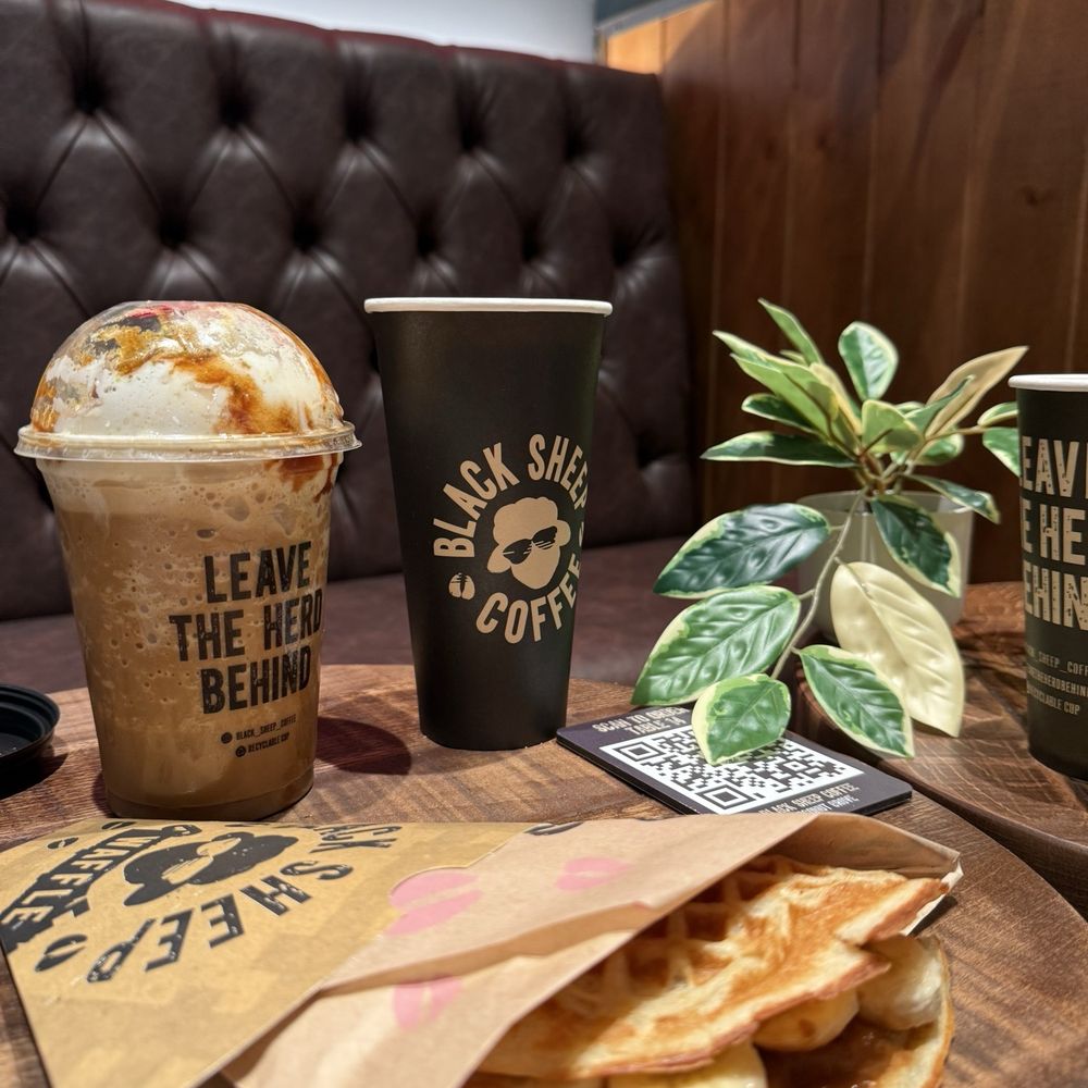 Black Sheep Coffee - Pistachio Latte tailored with the finest Decaf selection, oat milk, and caramel drizzle. Accompanied by a Norwegian crusty Banofi Waffle. - Coffee & Tea Near Me - Miami, Florida