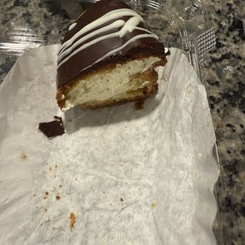 DOLCE & AMARO ARTISAN BAKERY - Inside of a Chantilly Eclair - Bakeries Near Me - Greensboro, North Carolina DOLCE & AMARO ARTISAN BAKERY - Inside of a Chantilly Eclair - Bakeries Near Me - Greensboro, North Carolina