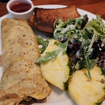 Cooks Tavern - The omelette which was extremely overdone as you can tell by all the brown - New American Near Me - Tacoma, Washington Cooks Tavern - The omelette which was extremely overdone as you can tell by all the brown - New American Near Me - Tacoma, Washington