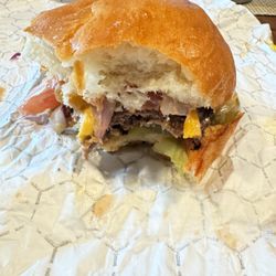 Joe Daddy's Burgers and More - Cheese Burger with oversized dry bun.