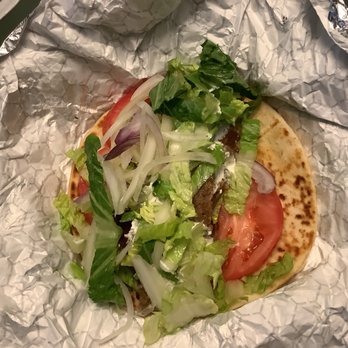 Opa Opa Taverna & Bakery - Gyro showing sauce on meat - Greek Near Me - Myrtle Beach, South Carolina Opa Opa Taverna & Bakery - Gyro showing sauce on meat - Greek Near Me - Myrtle Beach, South Carolina