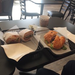 The Neighborhood Cafe - A Turkey Cranberry Croissant, and a Roast Beef on Bolillo Roll.