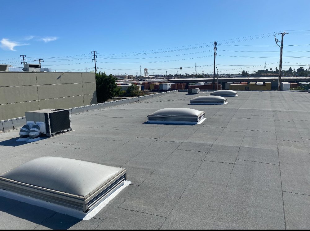 Slide of TopStamp Roofing