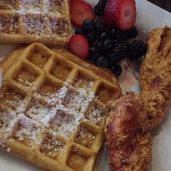 CRAFThouse - Chicken and waffles with a side of fruit! Breakfast served all day - New American Near Me - San Marcos, Texas