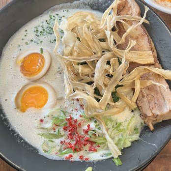 Menya Shono - DX Tori Paitan with egg, Gobo (burdock root) strips, kale, green onions, thick slab of chashu and red ginger. - Ramen Near Me - San Rafael, California Menya Shono - DX Tori Paitan with egg, Gobo (burdock root) strips, kale, green onions, thick slab of chashu and red ginger. - Ramen Near Me - San Rafael, California