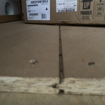 Moore Liberty Buildings - Gap in repaired flooring by door - Sheds & Outdoor Storage Near Me - Liberty Hill, Texas